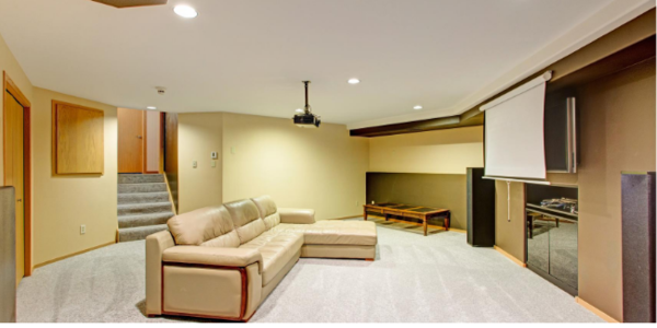 Louisville Basement Remodel with Projector, Fire Place, Tan Leather Couch, and Yellow Walls